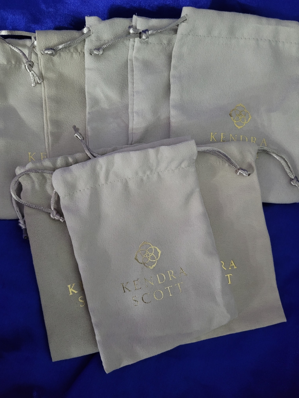 Kendra Scott Light Gray Drawstring Jewelry Pouches with Gold Logo (Set of 8)